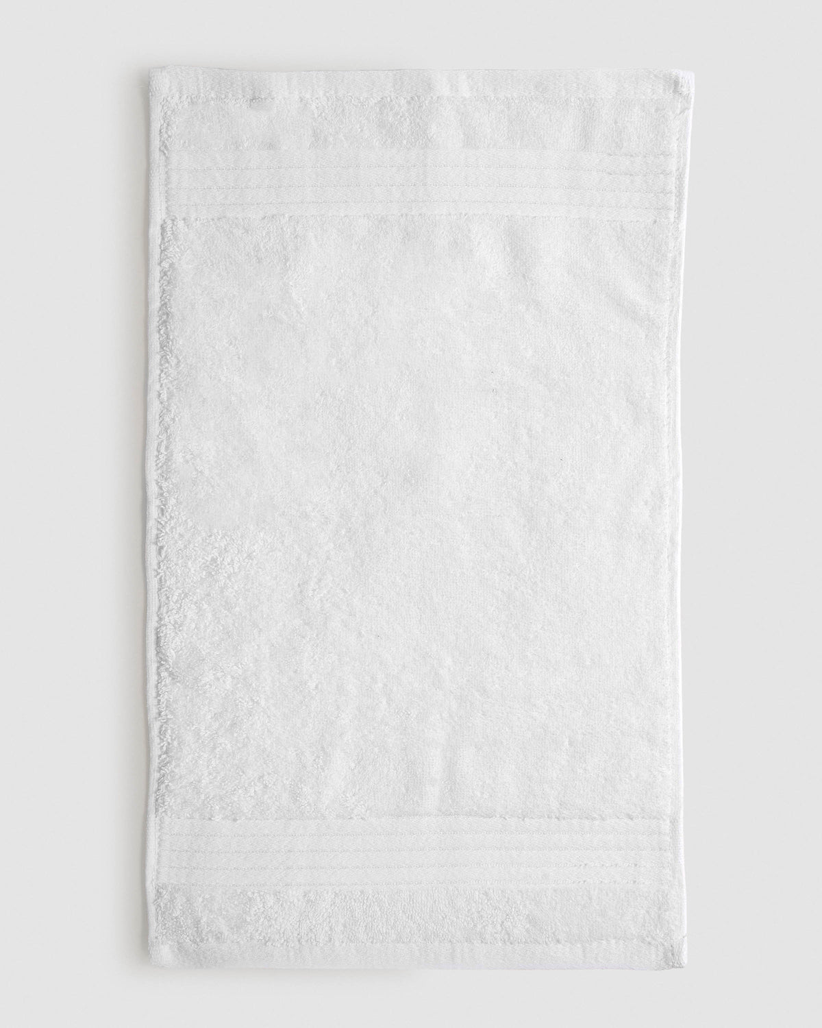 Tovallola de bany 700gr sanefa ratlles blanc