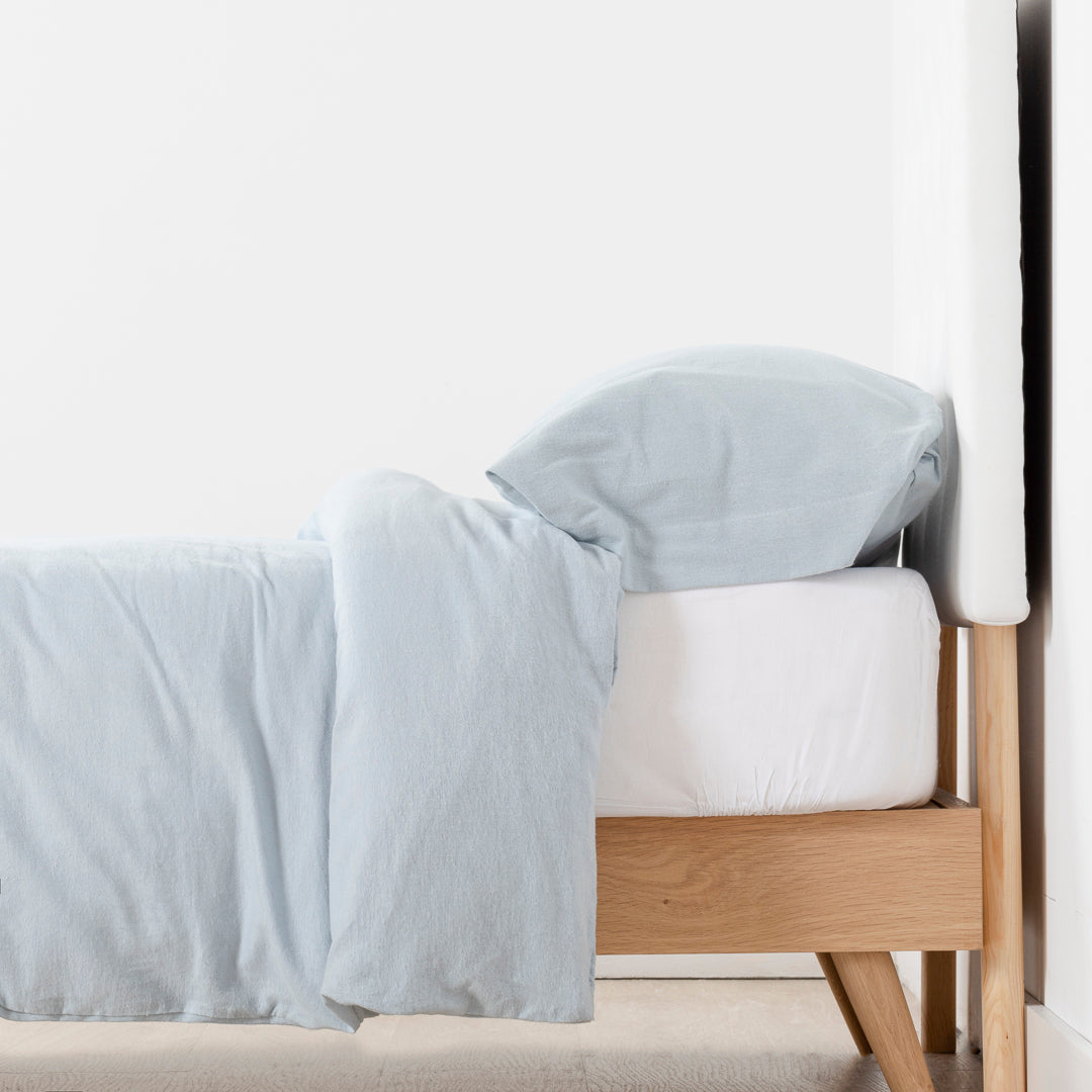 Housse de couette en flanelle bleu clair uni