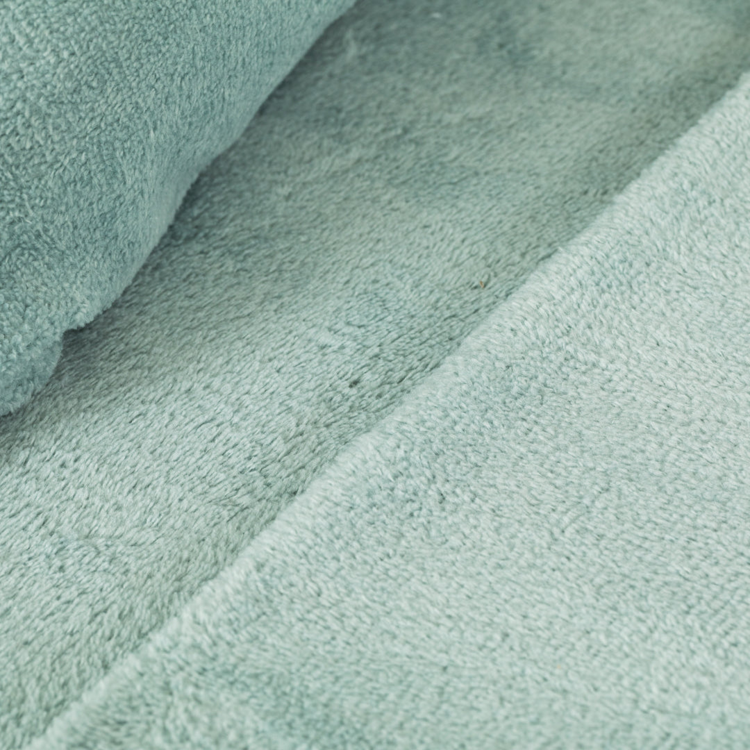 Plain coral fleece crib sheet set