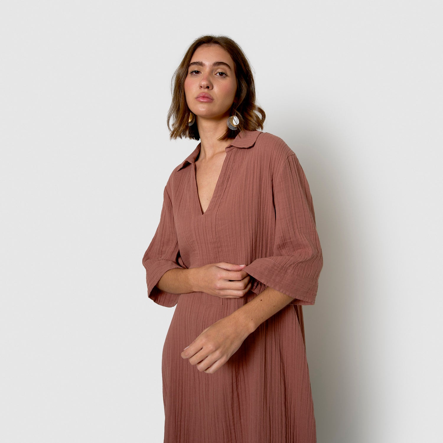 Abito corto in mussola con rosette