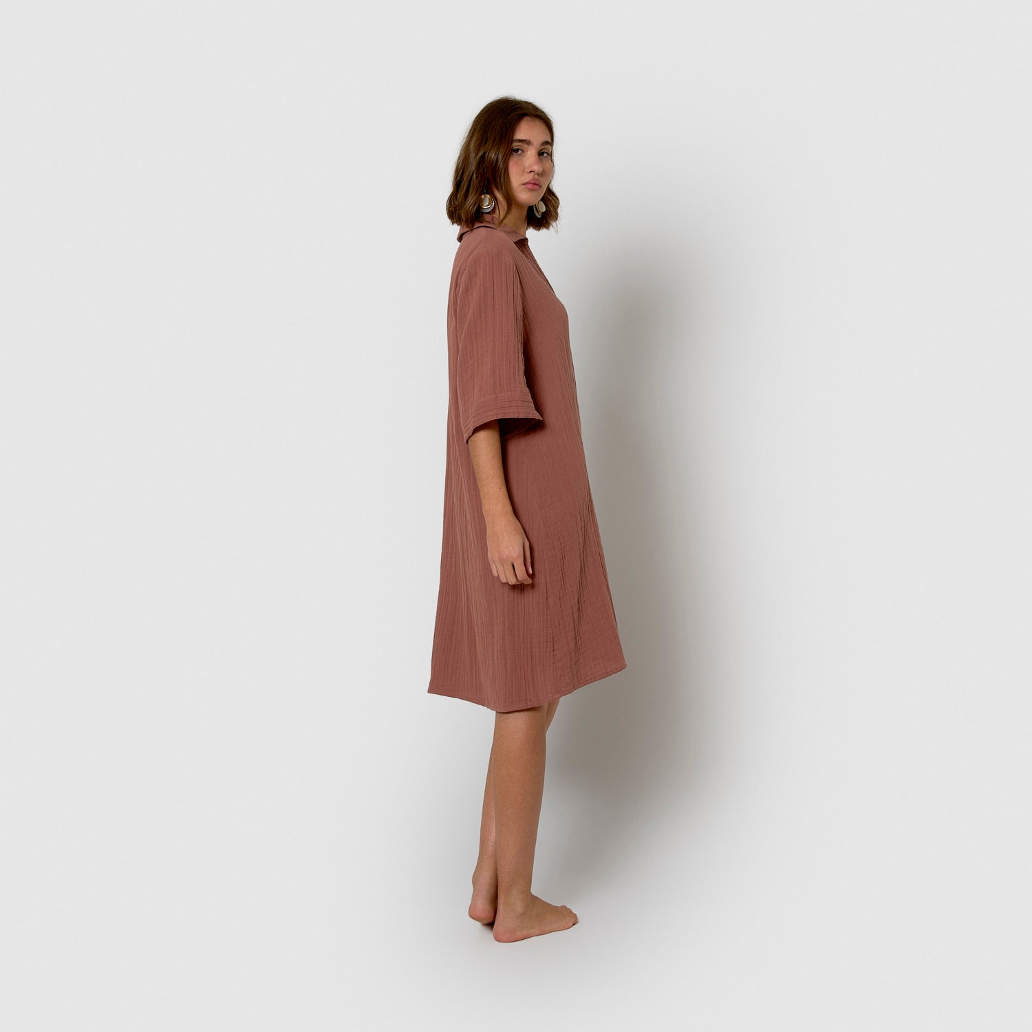 Abito corto in mussola con rosette