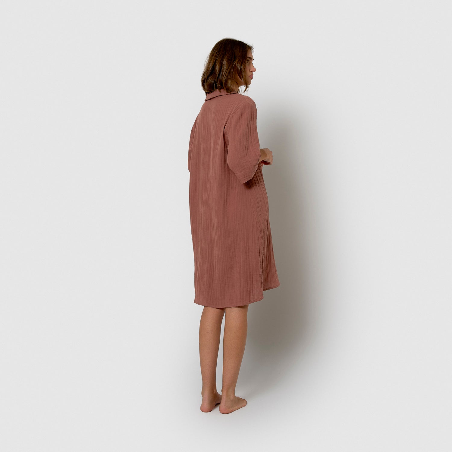 Abito corto in mussola con rosette