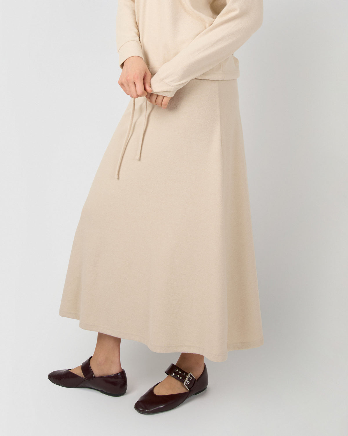 Set sudadera falda angorina beige