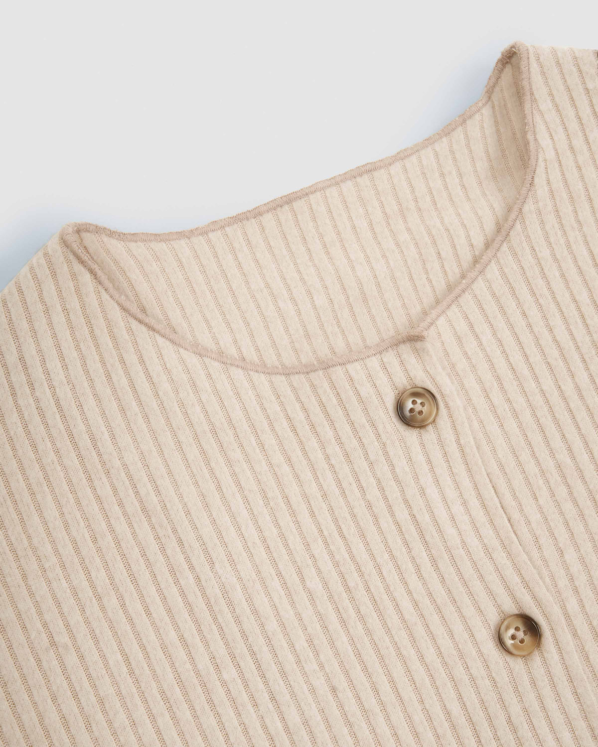 Rebeca botón canalé lisa beige