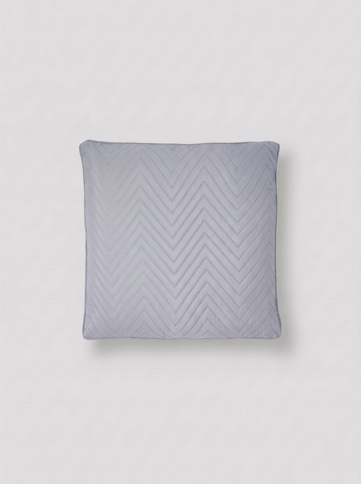 Cojín detalle zigzag liso gris perla