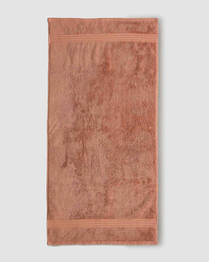 Serviette de bain 700gr bordure rayée caldera