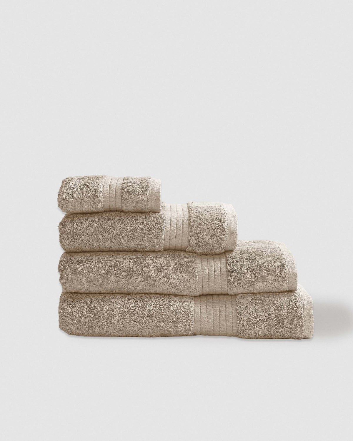 Toalla de baño 700gr cenefa rayas gris claro