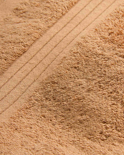 Toalla de baño 700gr cenefa rayas ocre