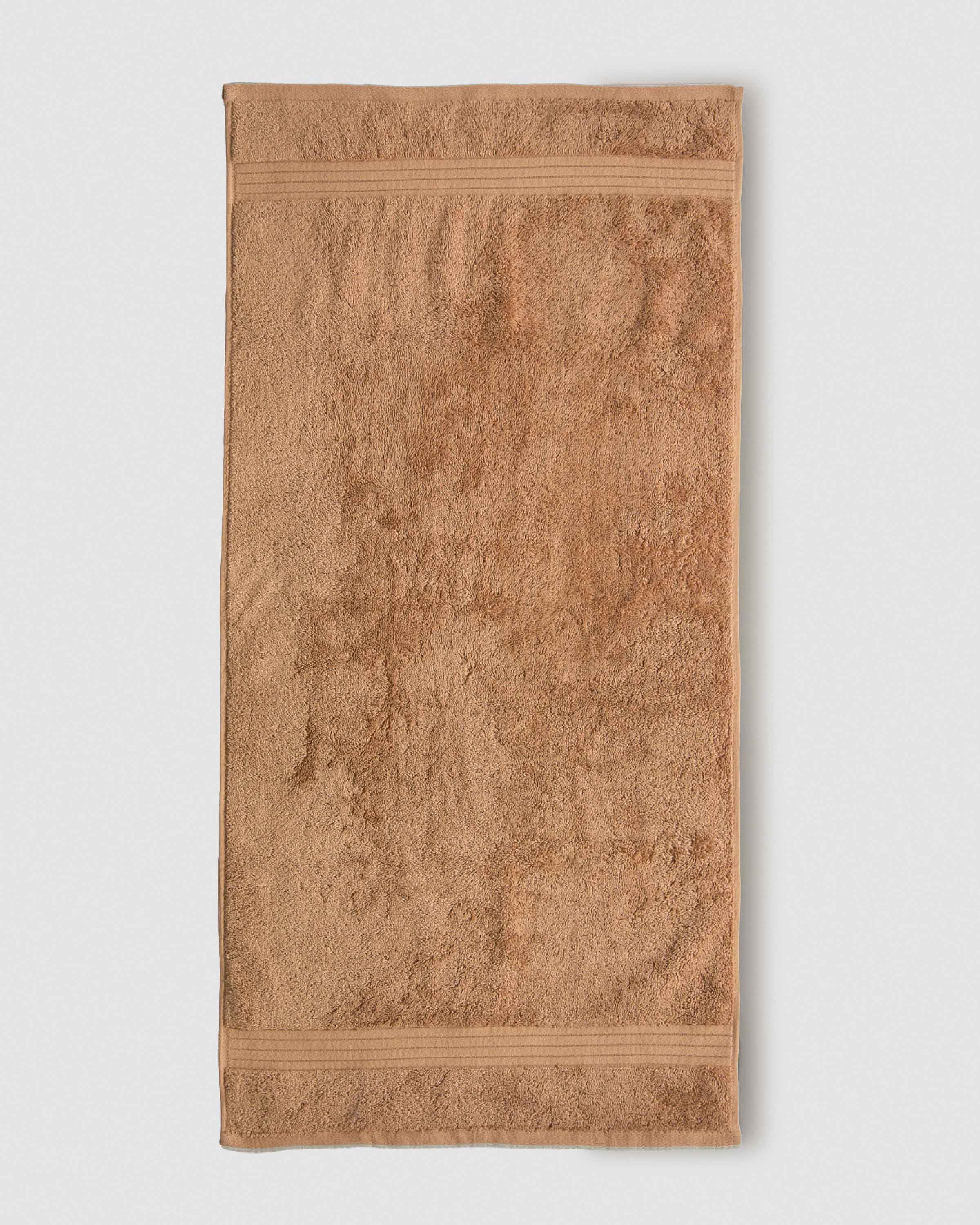 Toalla de baño 700gr cenefa rayas ocre