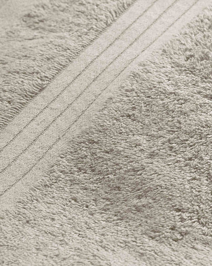 Toalla de baño 700gr cenefa rayas topo