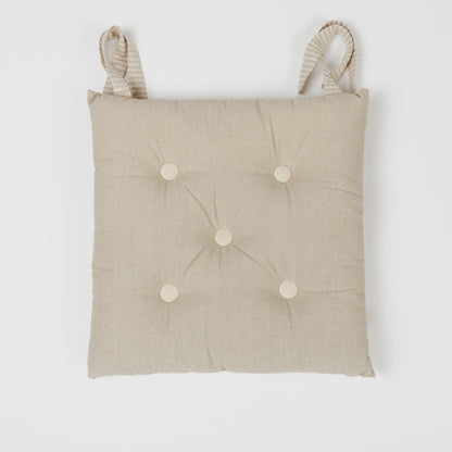 Cojín plancheta botones algodón liso
