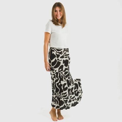 Saia de viscose para o meio do dia, bege e preta, da Teudis.