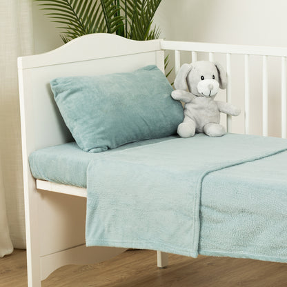 Plain coral fleece crib sheet set