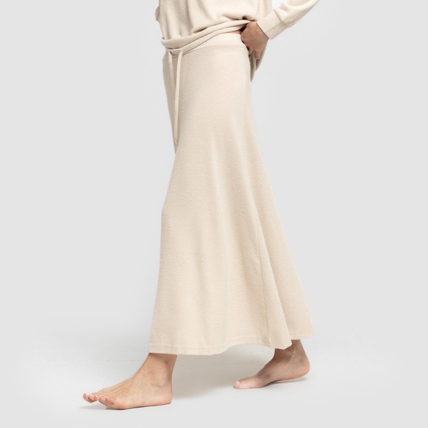 Falda midi evase new punto extra suave