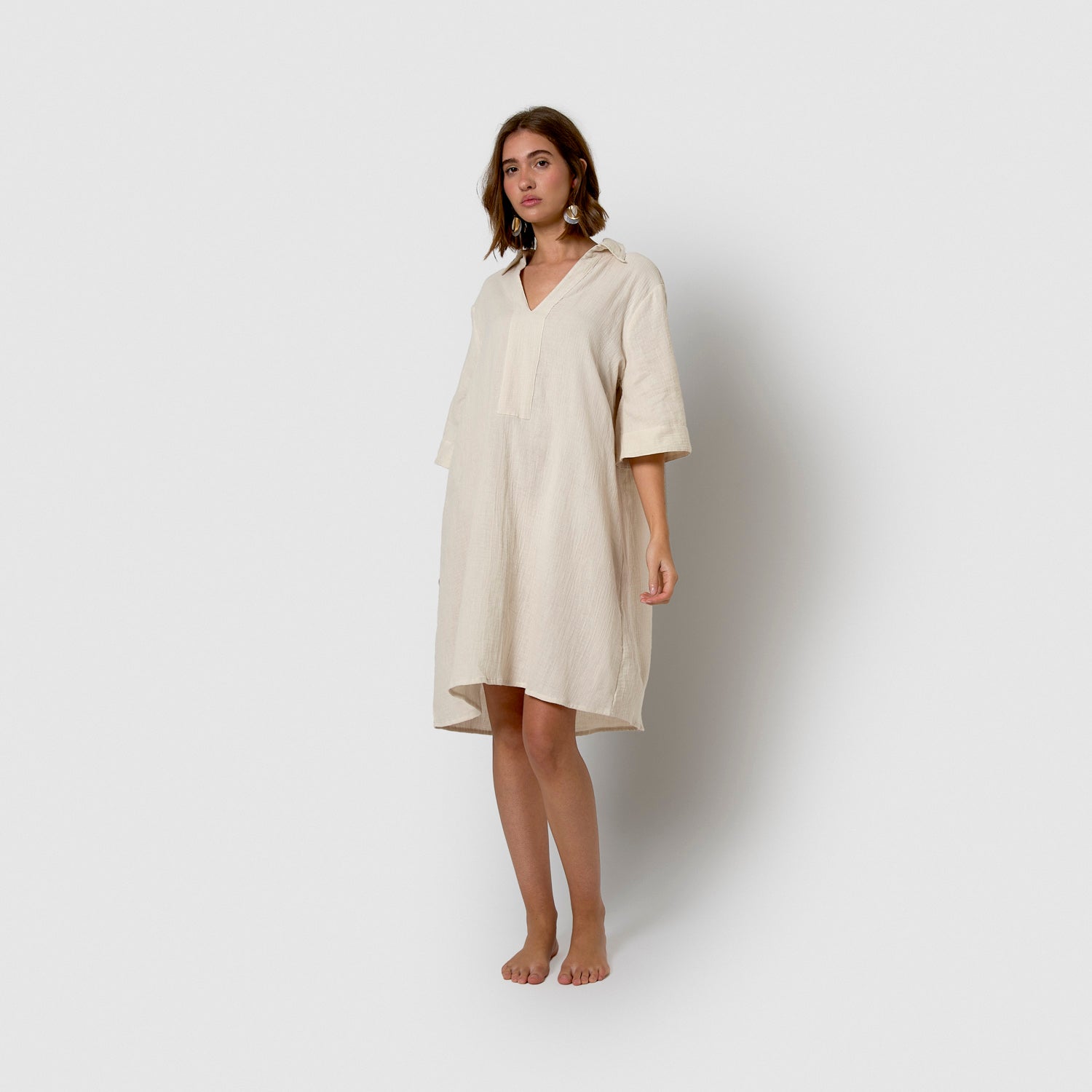 Abito corto di mussola bianca